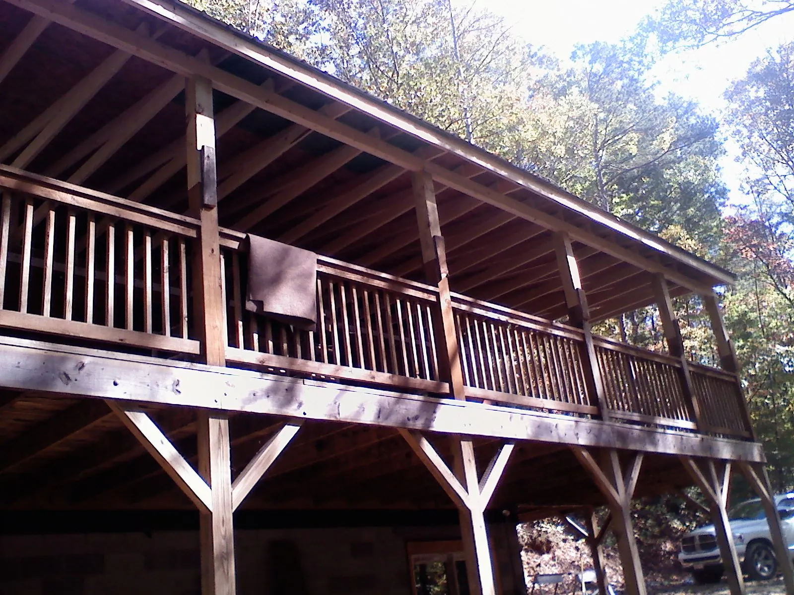 Timber framing under a new elevated porch and deck — Roof Leak Repair in Caneyville by Roofing Brothers